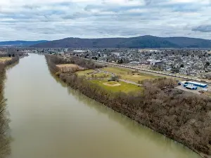 Sayre, PA, USA - 03-03-2024 - Cloudy winter aerial image of the downtown area in the City of Sayre, PA