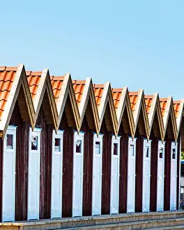 Foto Prints: Scandinavian architecture with row of red summerhouses in Fotö hamn