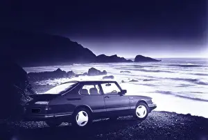 Getting Away From It All Prints: Scanned image of a Classic Saab Turbo car on a deserted beach in Devon