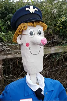 Scare Prints: Scarecrow looking like Postman Pat