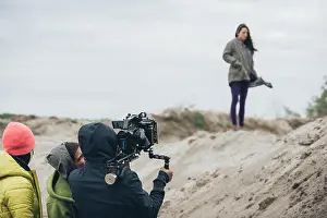 Woman Work Prints: Behind the scene. Actress in front of the camera on the film set outdoor location
