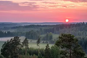 Scenery high angle view with sunset and evening light at summer in Finland