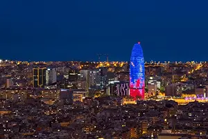 Scenic aerial view of Barcelona city skyscraper and skyline at night in Barcelona, Spain