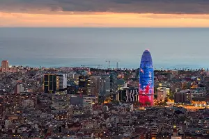 Scenic aerial view of Barcelona city skyscraper and skyline at night in Barcelona, Spain