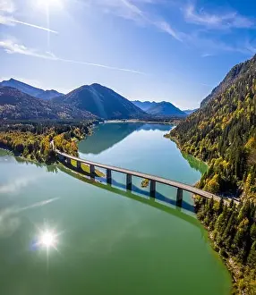 Karwendel Prints: Scenic aerial view of the bridge over Lake Sylvenstein with beautiful reflections