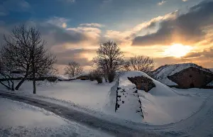 Scenic landscape with historical brick wall and sunset at evening light in Helsinki, Finland