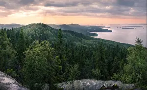 Scenic landscape with lake and sunset at evening in Koli, national park