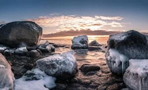 Images Dated 24th February 2017: Scenic landscape with sea and sunset at winter time