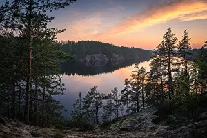 Blue Lake Prints: Scenic landscape with sunset and lake at summer evening in Finland