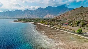 Scenic landscape on West Bali with blue ocean and mountains in Pemuteran area