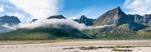 Images Dated 26th July 2017: Scenic mountain landscape with low clouds at sunny summer day in Lofoten Islands, Norway