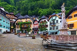 Scenic picture-postcard view of famous Hallstatt mountain village in the Austrian Alps