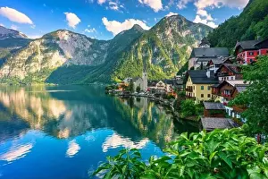 Salzburg Prints: Scenic picture-postcard view of famous Hallstatt mountain village in the Austrian Alps