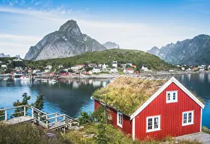 Scenic view from idyllic village with mountains at bright summer day in Hamnoy, Lofoten, Norway