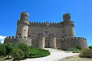 Stone Building Prints: A scenic view of the medieval New Castle of Manzanares el Real in Spain