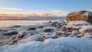 Images Dated 24th February 2017: Scenic winter landscape with sea and sunrise at morning. Beautiful light with rocky coast in Finland