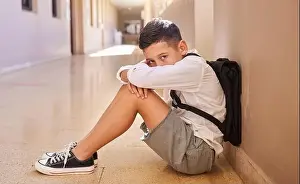 Discrimination Prints: School child, bullying and sad student on ground for depression