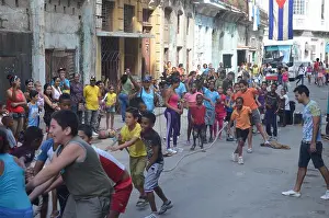 Havana Prints: School children taking part in a sports day / tug-o-war contest on the streets of Centro Havana