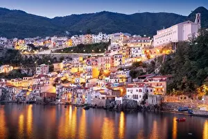 Scilla, Italy waterfront buildings at the port at dusk