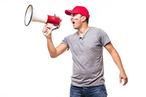 Hockey Prints: Scream on megaphone Poland football fan in game supporting of Poland national team on white background