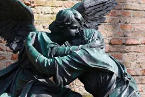 Embracing Prints: Sculpture of an angel embracing a woman