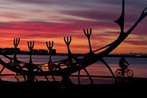 Silhouetted Prints: Sculpture of a Viking ship on Reykjavik Embankment Iceland