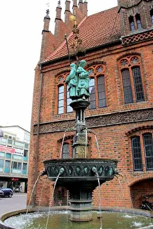 Gothic Style Prints: Sculptures atop Hase-Brunnen, a bronze late 19th-century fountain on the Market Square