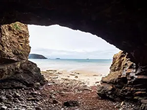 Pebble Prints: A sea cave at Little Haven in Pembrokeshire, Wales, UK