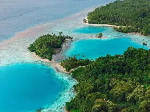 Blue Sea Prints: Sea coastline with blue hole in big lagoon and tropical scenic landscape in Indonesia