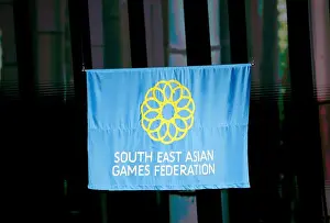 Manila Prints: SEA Games official flag is raised during the opening ceremony of the 30th Southeast Asian Games at the Philippines