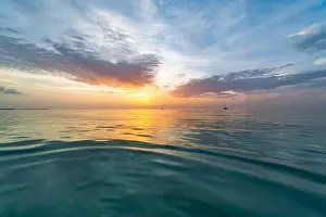 Sea sky clouds, horizon. Colorful seascape horizontal background banner. Inspirational calm sea with sunset sky. Meditation ocean and sky background