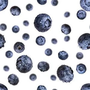Blueberry Prints: Seamless pattern with falling fresh blueberries isolated on white background. Flying berry