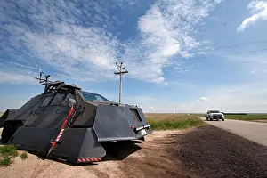Armored Prints: Sean Casey and the Tornado Intercept Vehicle 2 sits alongside a road near Salina Kansas June 3 2009
