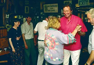 Clare Prints: Sean Keane of the famous Chieftains dances with his wife at the Roadside Tavern