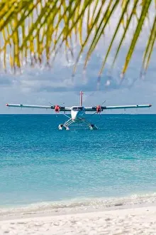 Seaplane at tropical beach resort. Luxury summer travel destination seaplane in Maldives islands. Exotic vacation holiday transportation, Maldives