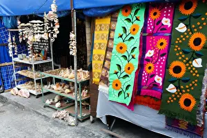 Yucatan Peninsula Prints: Seashells and colorful table runners in the Mercado 28 souvenirs and handicrafts market in Cancun