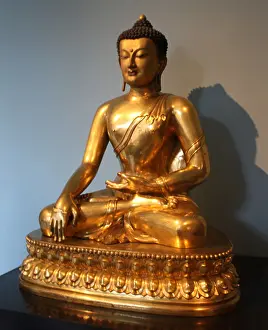 Shown Prints: Seated Buddha, Chinese, 1740-1786, is shown just before his enlightenment. Gilded copper