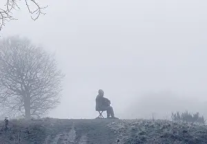 Lone Prints: Seated Figure by Sean Henry, a large-scale painted bronze sculpture