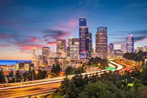 Seattle, Washington, USA downtown skyline and highways at dusk