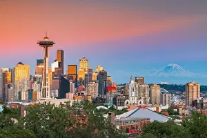 Seattle, Washington, USA downtown skyline at twilight with Mt. Rainier