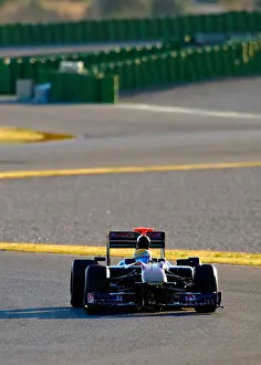 Races Prints: Sebastien BUEMI (SUI) driving the Toro Rosso STR4 Formula One racing car in February 2010