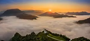 Julian Alps Prints: Sebrelje, Slovenia - Aerial panoramic drone view of the beautiful hilltop church of St