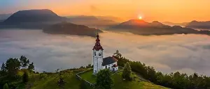 Julian Alps Prints: Sebrelje, Slovenia - Aerial panoramic drone view of the beautiful hilltop church of St