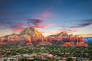 Sedona, Arizona, USA downtown and Coffee Pot Mountain at dusk
