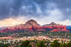 Sedona, Arizona, USA downtown and Coffee Pot Mountain at dusk