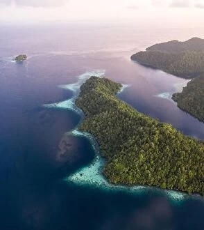 Aerial Landscape Collection: Seen from above, the many tropical islands within Raja Ampat, Indonesia