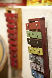 Exposition Prints: Selective of two hanging vintage xylophones in the toy museum
