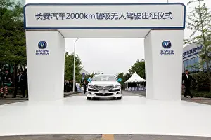 Chongqing Prints: A self-driving car produced by Changan Automobile departs for Beijing after a launching ceremony in Chongqing