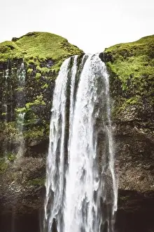 Stone Stream Prints: Seljalandsfoss waterfall, Gljufrabui Iceland - vertical drone photo