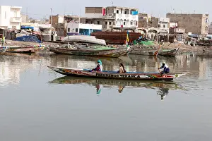 Senegal Prints: Senegal, Saint Louis. Canoe Ferrying Passengers Across the Senegal River from Guet N'Dar to Saint Louis